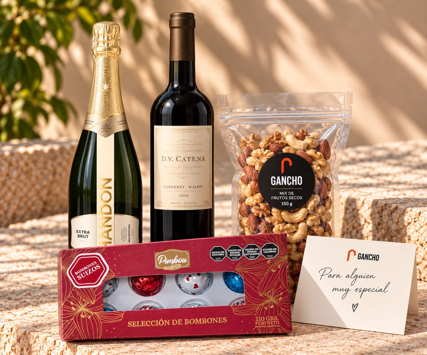 Box Brindis: champagne, vino tinto, caja de bombones, mix de frutos secos, caja Gancho y tarjeta